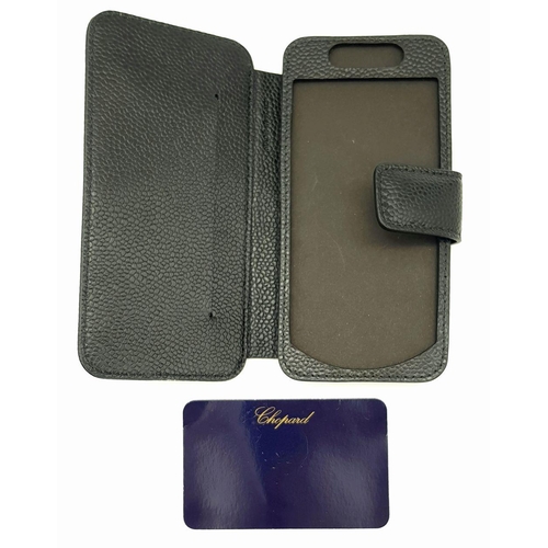 389 - A Chopard Black Phone Case. Approximately 14cm height x 5cm length. In good condition but please see... 