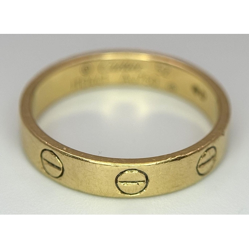 39 - A Cartier 18K Yellow Gold Love Ring. Size L. 3.2g.