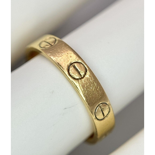 39 - A Cartier 18K Yellow Gold Love Ring. Size L. 3.2g.