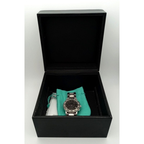 4 - A Tiffany and Co. Quartz Ladies Watch. Stainless steel bracelet and case - 36mm. Black dial with thr... 