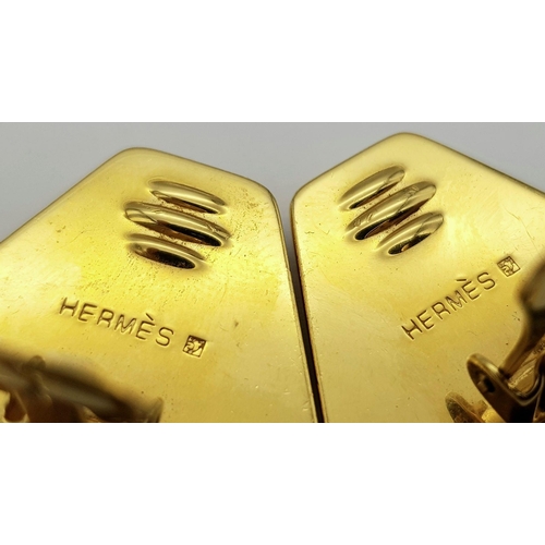 410 - A Pair of Hermes Decorative Enamel Clip-On Earrings.