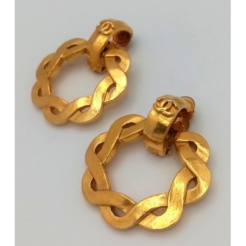 459 - A Pair of Designer Chanel Gold Plated Woven Circular Clip-On Earrings. 5cm x 4cm. Comes in original ... 