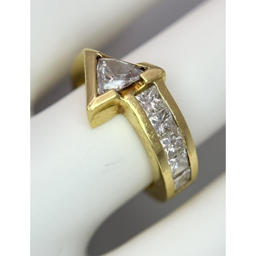 46 - Two 18K Gold Diamond Rings: An 18K yellow gold princess and trillion cut diamond arrowhead ring - 1.... 