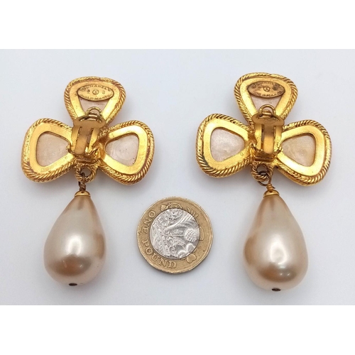 592 - A Pair of Designer Chanel Dress Clip-On Drop Earrings. Faux pearl with gilded scroll borders. 6cm. C... 