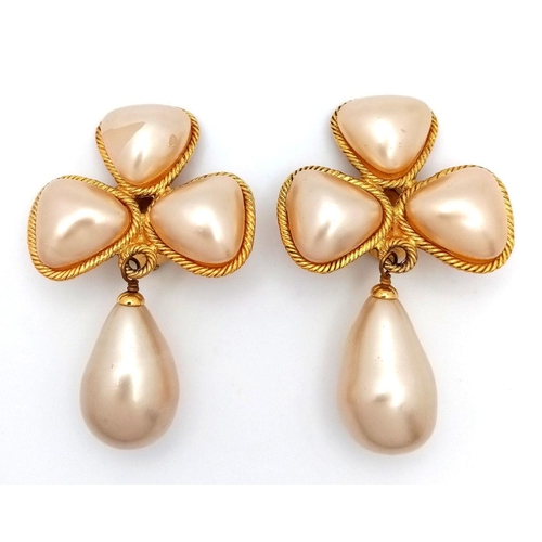 592 - A Pair of Designer Chanel Dress Clip-On Drop Earrings. Faux pearl with gilded scroll borders. 6cm. C... 