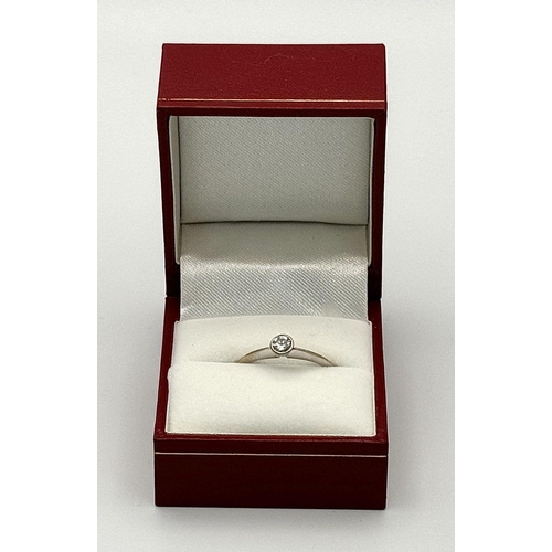 688 - An 18K white gold ring set with a brilliant cut solitaire diamond - 0.25ct. Size O. 2.8g total weigh... 