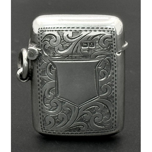 723 - An Antique Sterling Silver Vesta Case. Chester hallmarks. 3.5cm x 2.5cm. 13g.