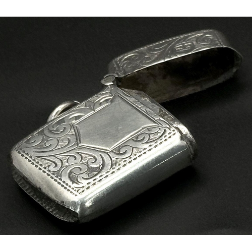 723 - An Antique Sterling Silver Vesta Case. Chester hallmarks. 3.5cm x 2.5cm. 13g.