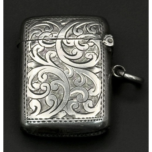 723 - An Antique Sterling Silver Vesta Case. Chester hallmarks. 3.5cm x 2.5cm. 13g.