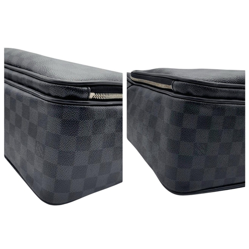 74 - A Louis Vuitton Damier Graphite Business Bag. Damier Graphite canvas exterior with silver-toned hard... 