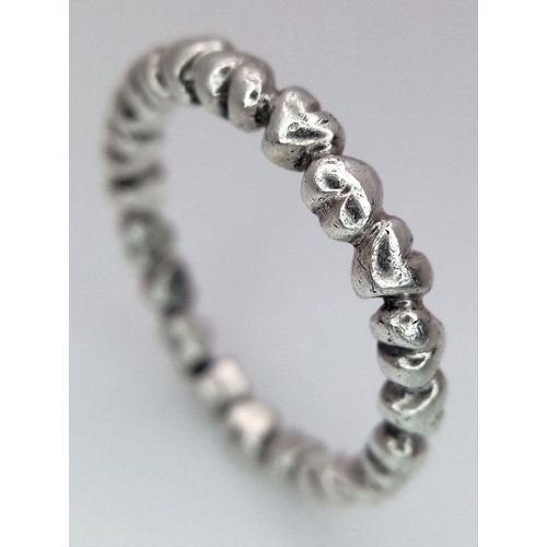 1084 - A PANDORA STERLING SILVER HEART BAND RING 2.9G TOTAL WEIGHT, SIZE O. Ref: SC 7094