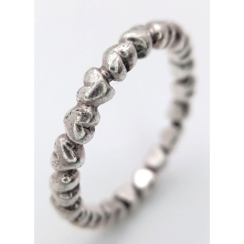 1084 - A PANDORA STERLING SILVER HEART BAND RING 2.9G TOTAL WEIGHT, SIZE O. Ref: SC 7094