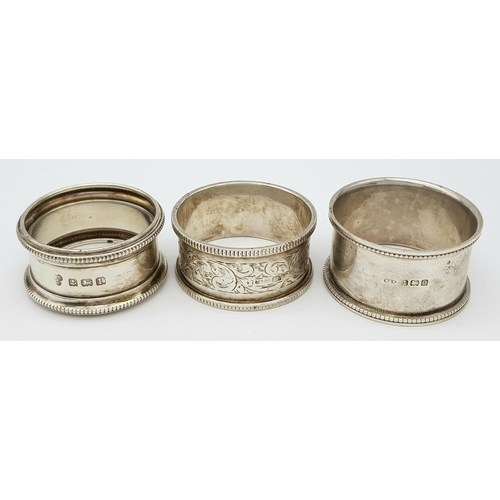 1349 - A collection of 3 antique sterling silver napkin holders with different designs. Full Birmingham hal... 