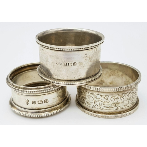 1349 - A collection of 3 antique sterling silver napkin holders with different designs. Full Birmingham hal... 