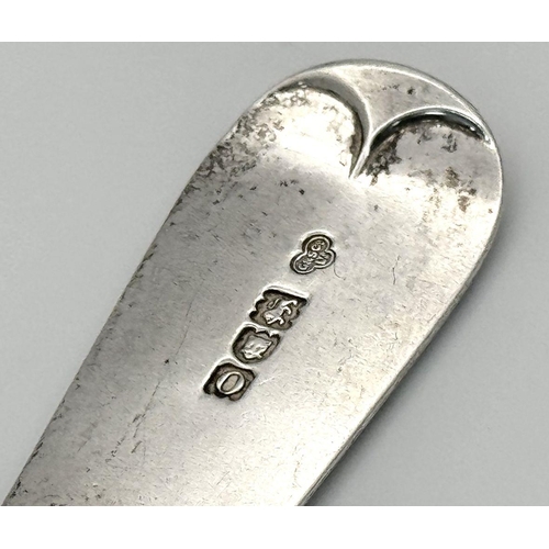 1482 - An antique sterling silver spoon. Full hallmarks London, 1909. Total weight 76.8G. Total length 23cm... 