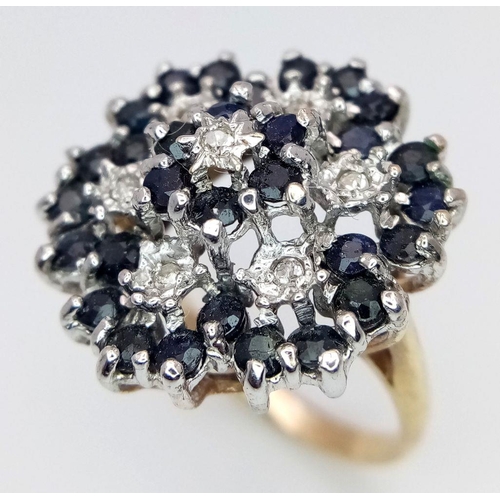 160 - A 9K YELLOW GOLD DIAMOND AND SAPPHIRE RING. 5.5G. SIZE O.