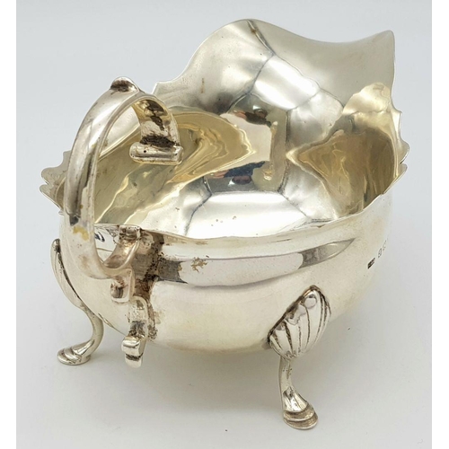 1655 - An Antique Sterling Silver Gravy Boat. Hallmarks for Birmingham 1907. 16cm length. 9cm tall. 139g.