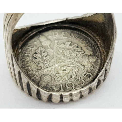 1657 - A vintage silver coin signet ring. Total weight 4.7G. Size K.