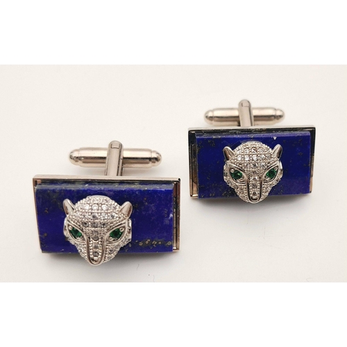 1710 - A pair of lapis panther cufflinks. Total weight: 20.7g. Comes with a presentation box.