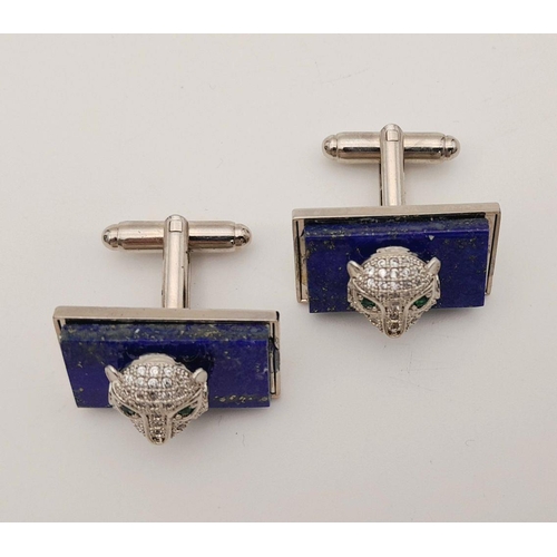 1710 - A pair of lapis panther cufflinks. Total weight: 20.7g. Comes with a presentation box.