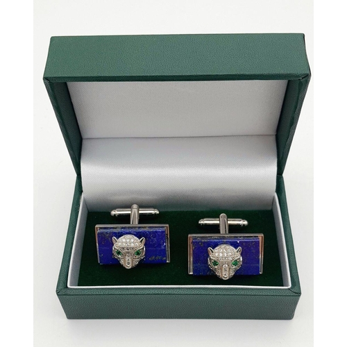 1710 - A pair of lapis panther cufflinks. Total weight: 20.7g. Comes with a presentation box.