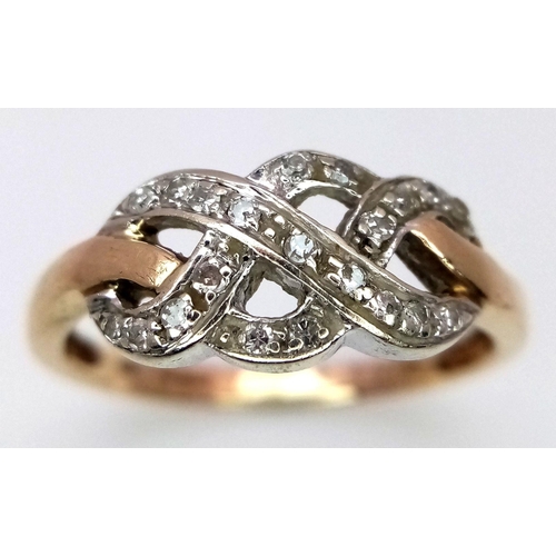 174 - A 9K YELLOW GOLD CELTIC KNOT DIAMOND SET RING - 2.6G. SIZE P.