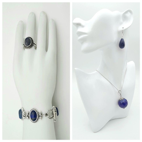 1775 - A set of Lapis Lazuli jewellery, including stone set ring (size S), a pair of 925 silver earrings, a... 