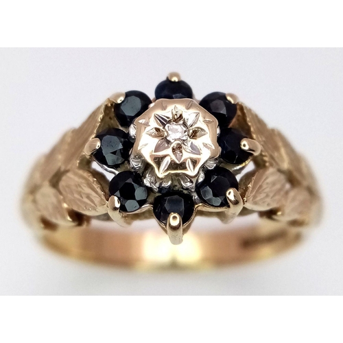 181 - A 9K YELLOW GOLD VINTAGE DIAMOND & SAPPHIRE RING. 2.6G. SIZE M.