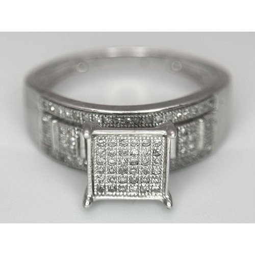 258 - A 9K WHITE GOLD DIAMOND RING 0.40CT 2.6G SIZE N 1/2. Ref: SC 7034