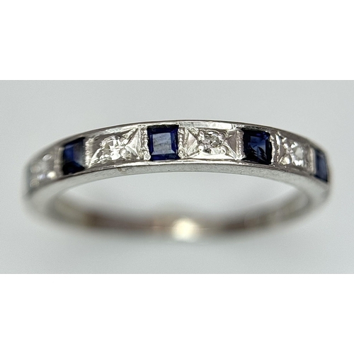 377 - A 18K WHITE GOLD DIAMOND & SAPPHIRE HALF ETERNITY RING 2.2G SIZE N 1/2. Ref: SC 7053