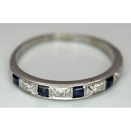 377 - A 18K WHITE GOLD DIAMOND & SAPPHIRE HALF ETERNITY RING 2.2G SIZE N 1/2. Ref: SC 7053