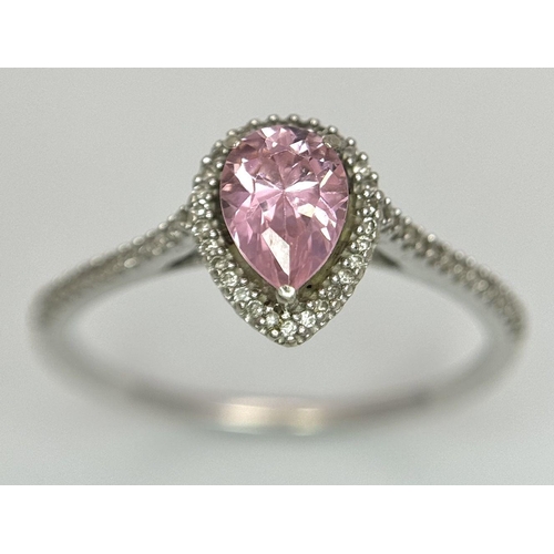 559 - A 9K WHITE GOLD DIAMOND & PINK TOPAZ RING 0.12CT D & 1.44CT PEAR SHAPE PINK TOPAZ 2.2G TOTAL WEIGHT,... 