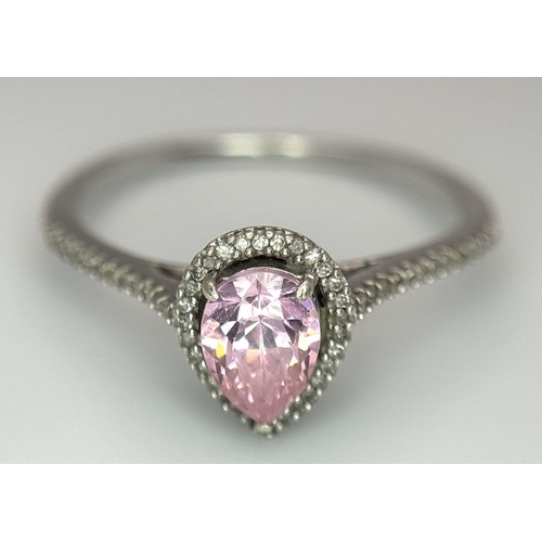 559 - A 9K WHITE GOLD DIAMOND & PINK TOPAZ RING 0.12CT D & 1.44CT PEAR SHAPE PINK TOPAZ 2.2G TOTAL WEIGHT,... 