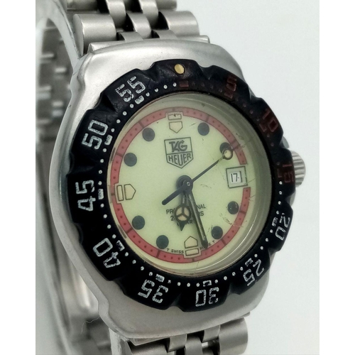 57 - A Vintage Tag Heuer Professional Quartz Ladies Watch. Stainless steel bracelet and case -25mm. Yello... 