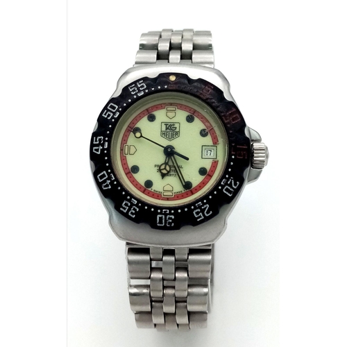 57 - A Vintage Tag Heuer Professional Quartz Ladies Watch. Stainless steel bracelet and case -25mm. Yello... 