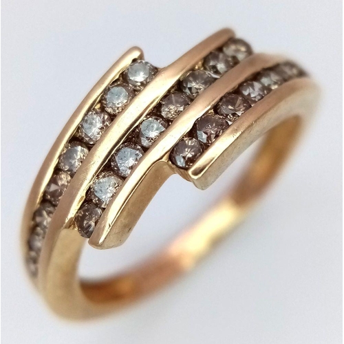 573 - A 9K YELLOW GOLD DIAMOND SET THREE ROW TWIST RING 0.15CT , 2.2G TOTAL WEIGHT, SIZE K 1/2. Ref: SC 70... 