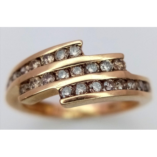 573 - A 9K YELLOW GOLD DIAMOND SET THREE ROW TWIST RING 0.15CT , 2.2G TOTAL WEIGHT, SIZE K 1/2. Ref: SC 70... 