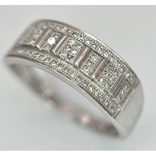 650 - A 9K WHITE GOLD DIAMOND RING 0.25CT 1.9G SIZE N. Ref: SC 7035