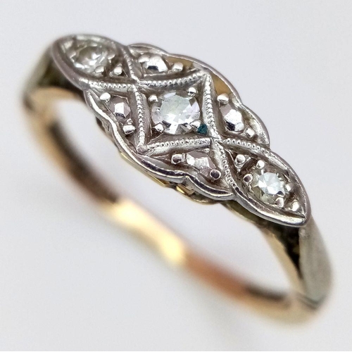 692 - A 9K YELLOW GOLD AND PLATINUM VINTAGE DIAMOND RING. 2.2G. SIZE O.