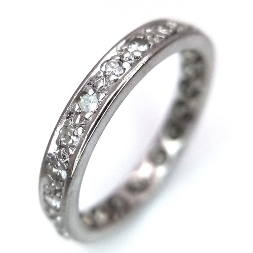 97 - AN 18K WHITE GOLD DIAMOND FULL ETERNITY RING 0.30CT 3.3G TOTAL WEIGHT, SIZE M. Ref: SC 7101