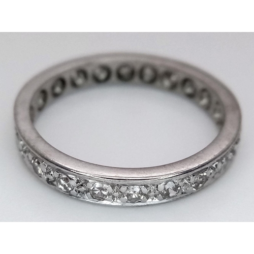 97 - AN 18K WHITE GOLD DIAMOND FULL ETERNITY RING 0.30CT 3.3G TOTAL WEIGHT, SIZE M. Ref: SC 7101