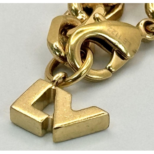 1230 - A Louis Vuitton Gold Plated Bracelet with Hanging Charms. 21cm.