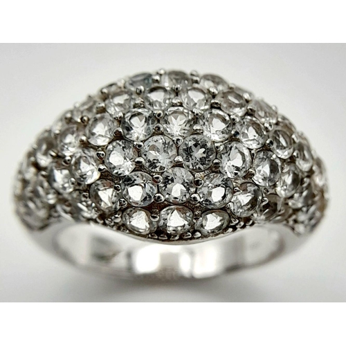 1575 - A Sterling Silver White Sapphire Set Cluster Ring Size P1/2. The Ring measures 1.4cm Wide at the Cro... 