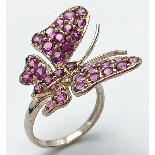 1589 - A Sterling Silver Pink Tourmaline Set Butterfly Design Ring Size Q. The Ring Measures 2.6cm Wide at ... 