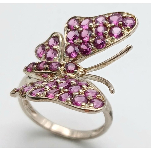 1589 - A Sterling Silver Pink Tourmaline Set Butterfly Design Ring Size Q. The Ring Measures 2.6cm Wide at ... 