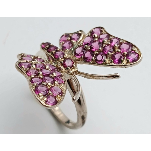 1589 - A Sterling Silver Pink Tourmaline Set Butterfly Design Ring Size Q. The Ring Measures 2.6cm Wide at ... 