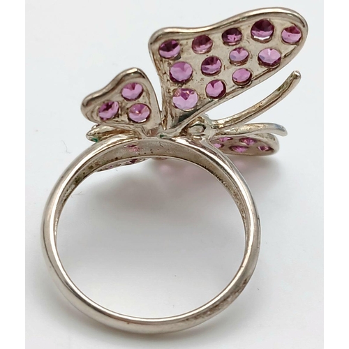 1589 - A Sterling Silver Pink Tourmaline Set Butterfly Design Ring Size Q. The Ring Measures 2.6cm Wide at ... 