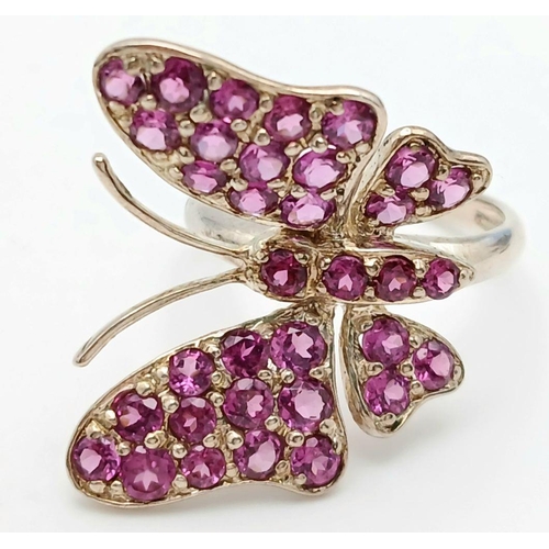 1589 - A Sterling Silver Pink Tourmaline Set Butterfly Design Ring Size Q. The Ring Measures 2.6cm Wide at ... 