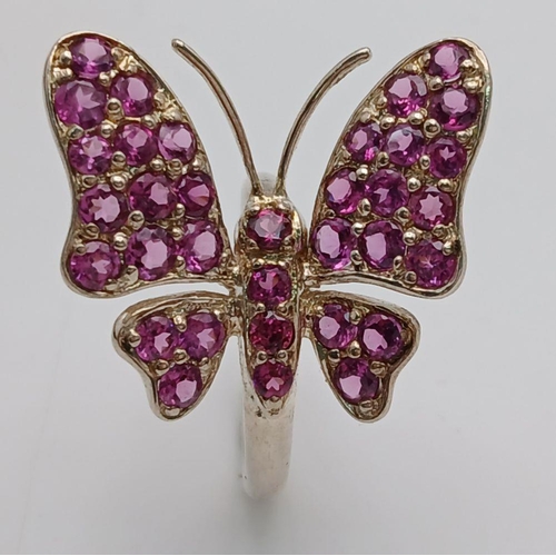 1589 - A Sterling Silver Pink Tourmaline Set Butterfly Design Ring Size Q. The Ring Measures 2.6cm Wide at ... 