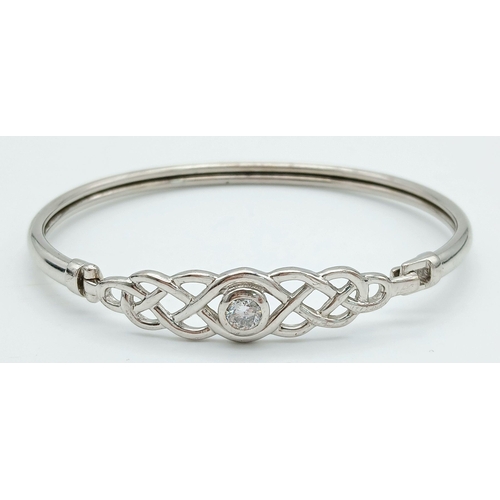 1561 - A Vintage Sterling Silver, Stone Set, Celtic Knot Design Bangle. 6cm Inner Width. Gross Weight 8.05 ... 